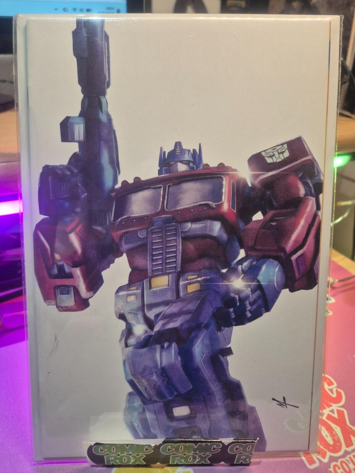 Transformers #25, Marco Turini Rare Exclusive Spotlight Variant, Ltd. 750, NM
