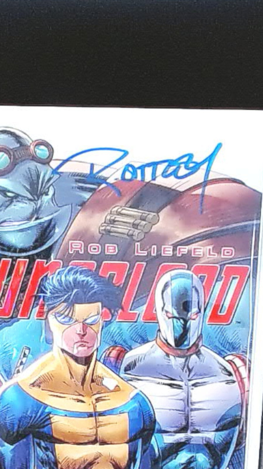 Youngblood #5, Invincible Team-Up Variant, SIGNED BY OTTLEY with COA